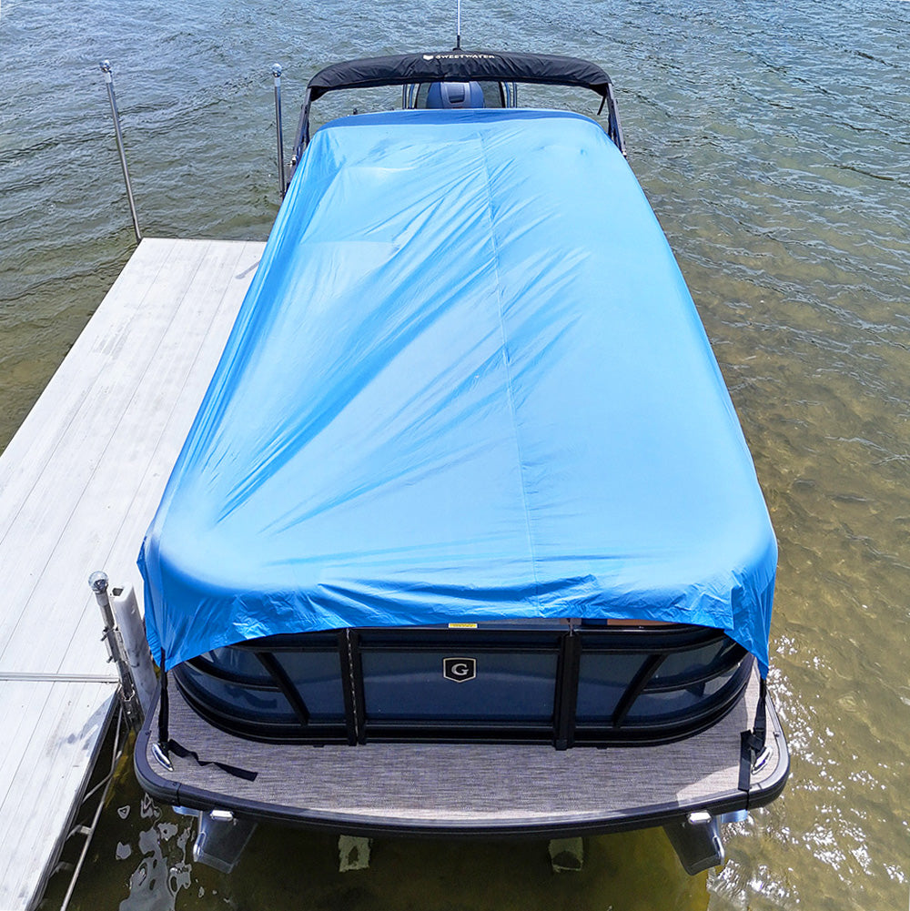 Quick Boat Cover on pontoon boat at dock, blue