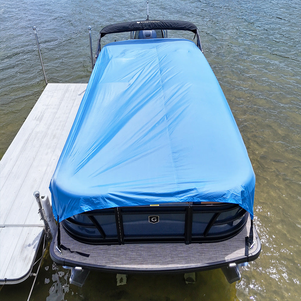 Aerial view of pontoon boat with Quick Boat Cover at dock